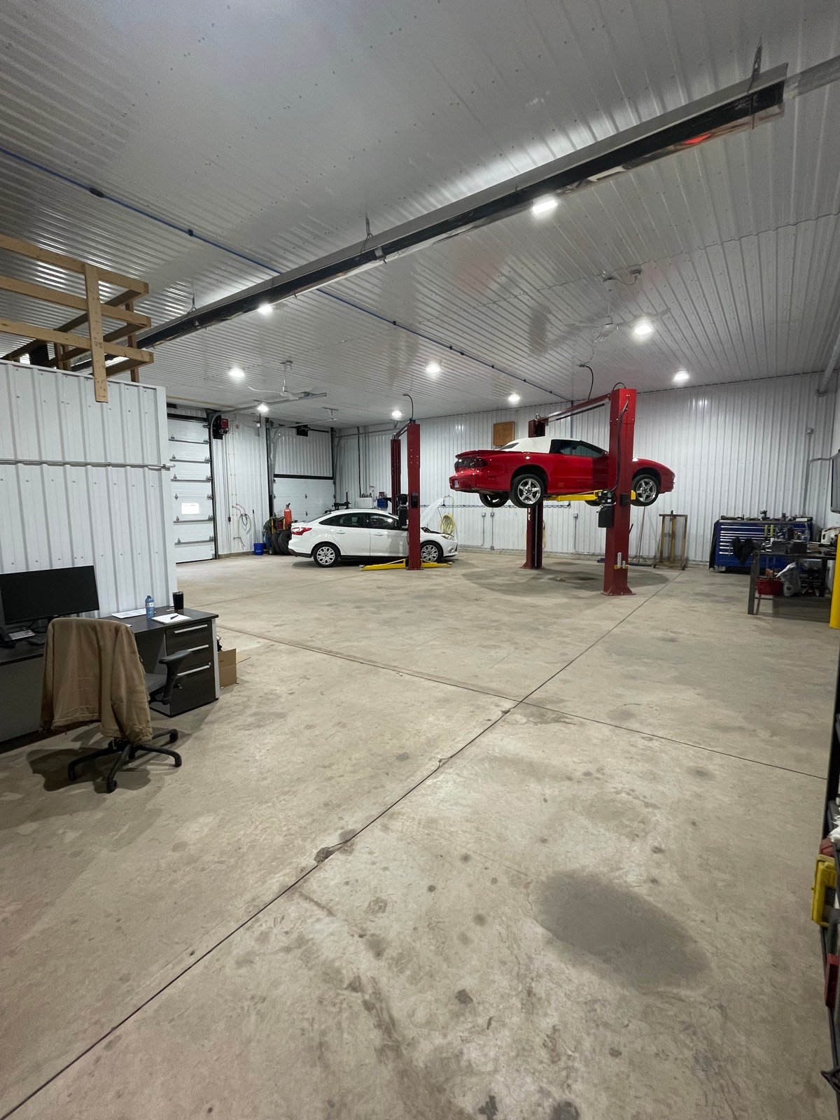 Wide view of the shop floor and service bays